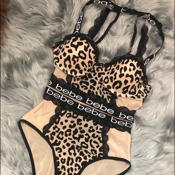bebe Tops - BEBE ANIMAL PRINT SEMI SHEER BODYSUIT